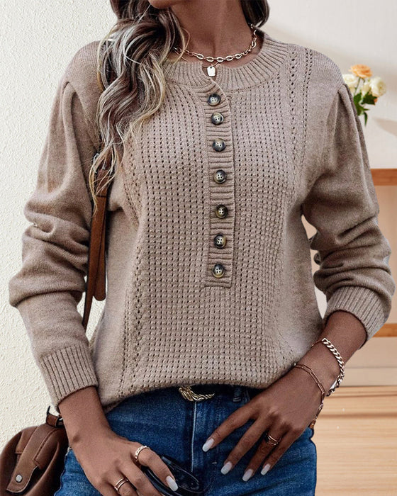 Trui met knoopsluiting en ronde hals