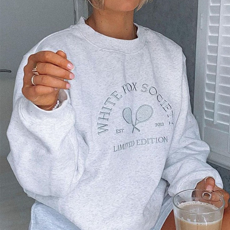 Ginevra™ - Sweater met luxe geborduurde tekst